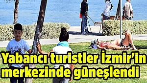 Yabancı turistler İzmir'in merkezinde güneşlendi
