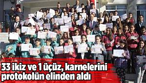 33 ikiz ve 1 üçüz, karnelerini protokolün elinden aldı