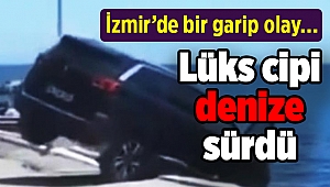 İzmir'de bir garip olay… Lüks cipi denize sürdü