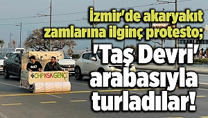 İzmir'de akaryakıt zamlarına ilginç protesto; 'Taş Devri' arabasıyla turladılar!