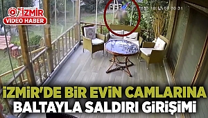 İzmir'de bir evin camlarına baltayla saldırı girişimi güvenlik kamerasında