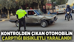 Ödemiş'te kontrolden çıkan otomobilin çarptığı bisikletli yaralandı