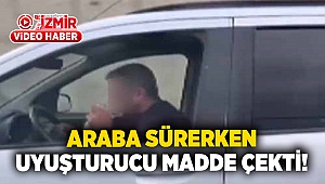 Araba sürerken uyuşturucu madde çekti!