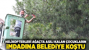 Helikopterleri ağaçta asılı kalan çocukların imdadına belediye koştu