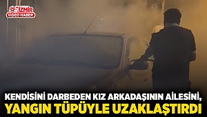 Kendisini darbeden kız arkadaşının ailesini, yangın tüpüyle uzaklaştırdı