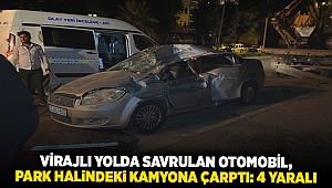 Virajlı yolda savrulan otomobil, park halindeki kamyona çarptı: 4 yaralı