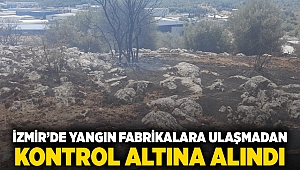 İzmir’de yangın fabrikalara ulaşmadan kontrol altına alındı