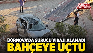 Bornova’da sürücü virajı alamadı bahçeye uçtu