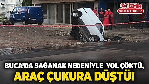 Buca’da sağanak nedeniyle yol çöktü, araç çukura düştü