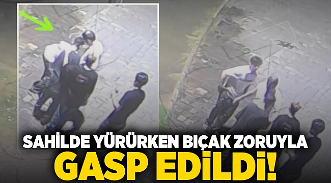 Sahilde yürüyen genç bıçak zoruyla gasp edildi!