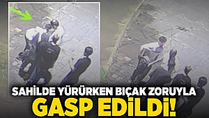 Sahilde yürüyen genç bıçak zoruyla gasp edildi!