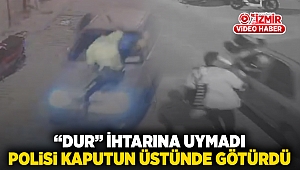 “Dur” ihtarına uymadı polisi kaputun üstünde götürdü