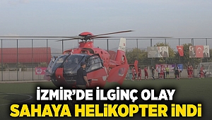 İzmir'de ilginç olay: Sahaya helikopter indi