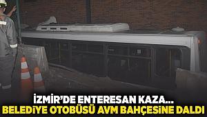 İzmir'de enteresan kaza... Belediye otobüsü AVM bahçesine daldı