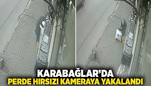 Karabağlar'da perde hırsızı kameraya yakalandı!