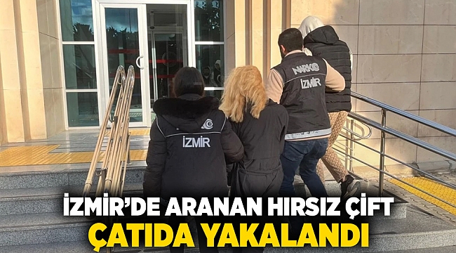 İzmir'de aranan hırsız çift, çatıda yakalandı